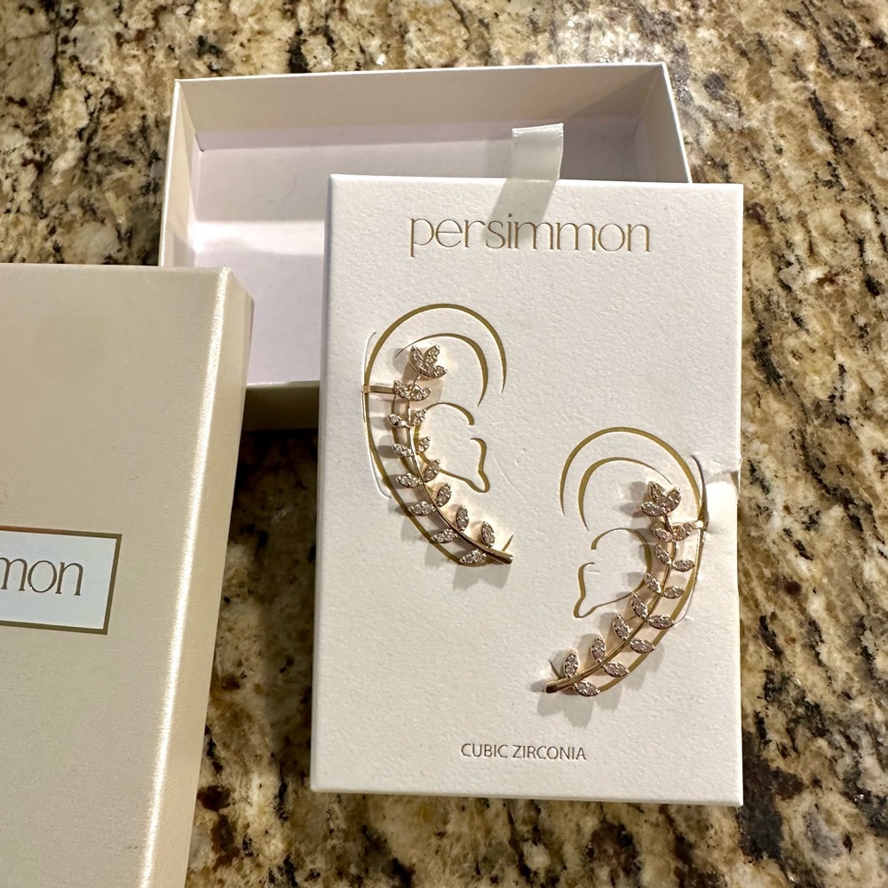 Elegant Gold Leaf Earrings with Sparkling Accents - Picture 2 of 3